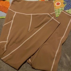This is a brownish nude colored pair of leggings.